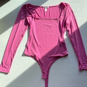 Pink long sleeve bodysuit
